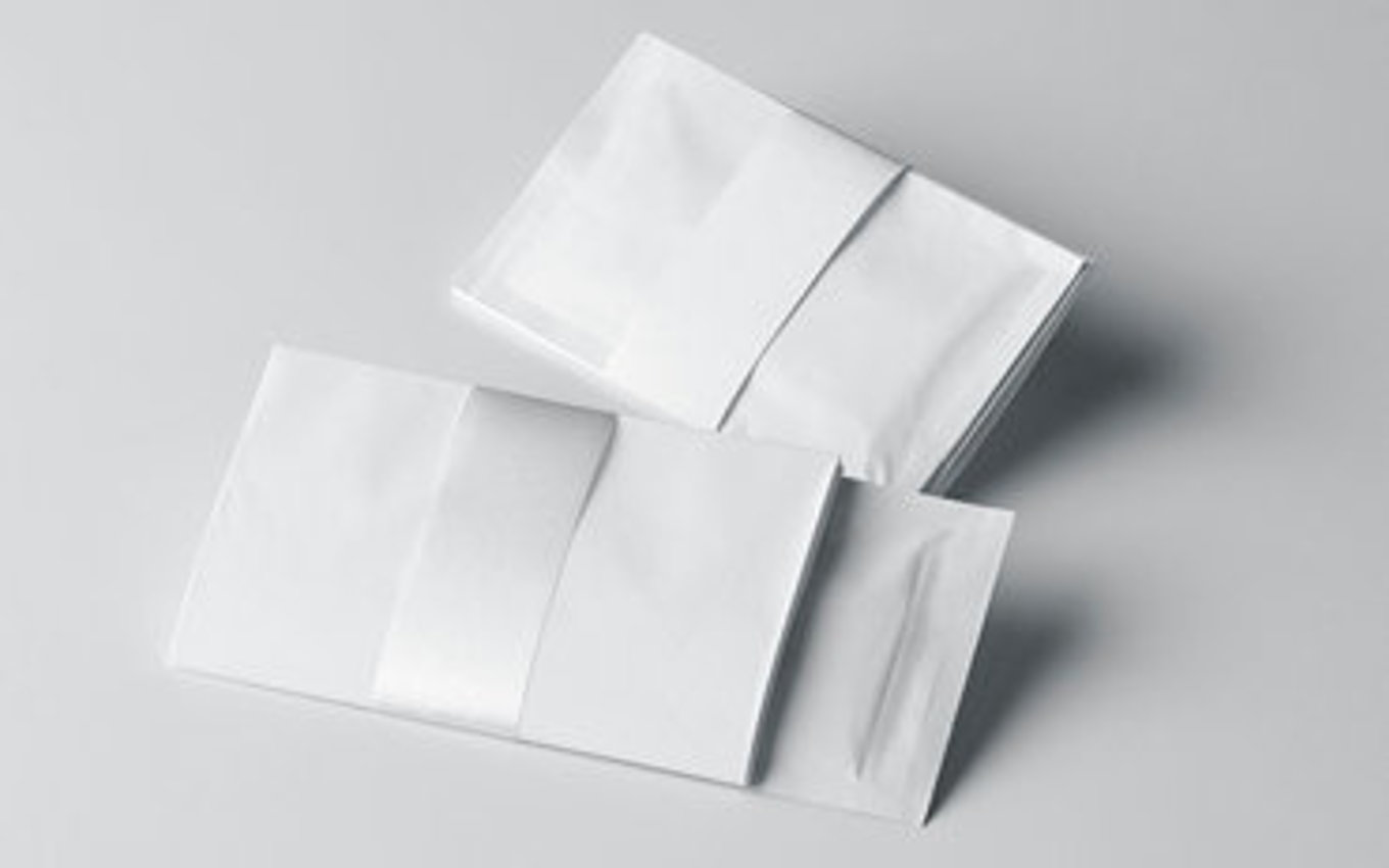 Folded package inserts from Faller Packaging for pharmaceutical products.