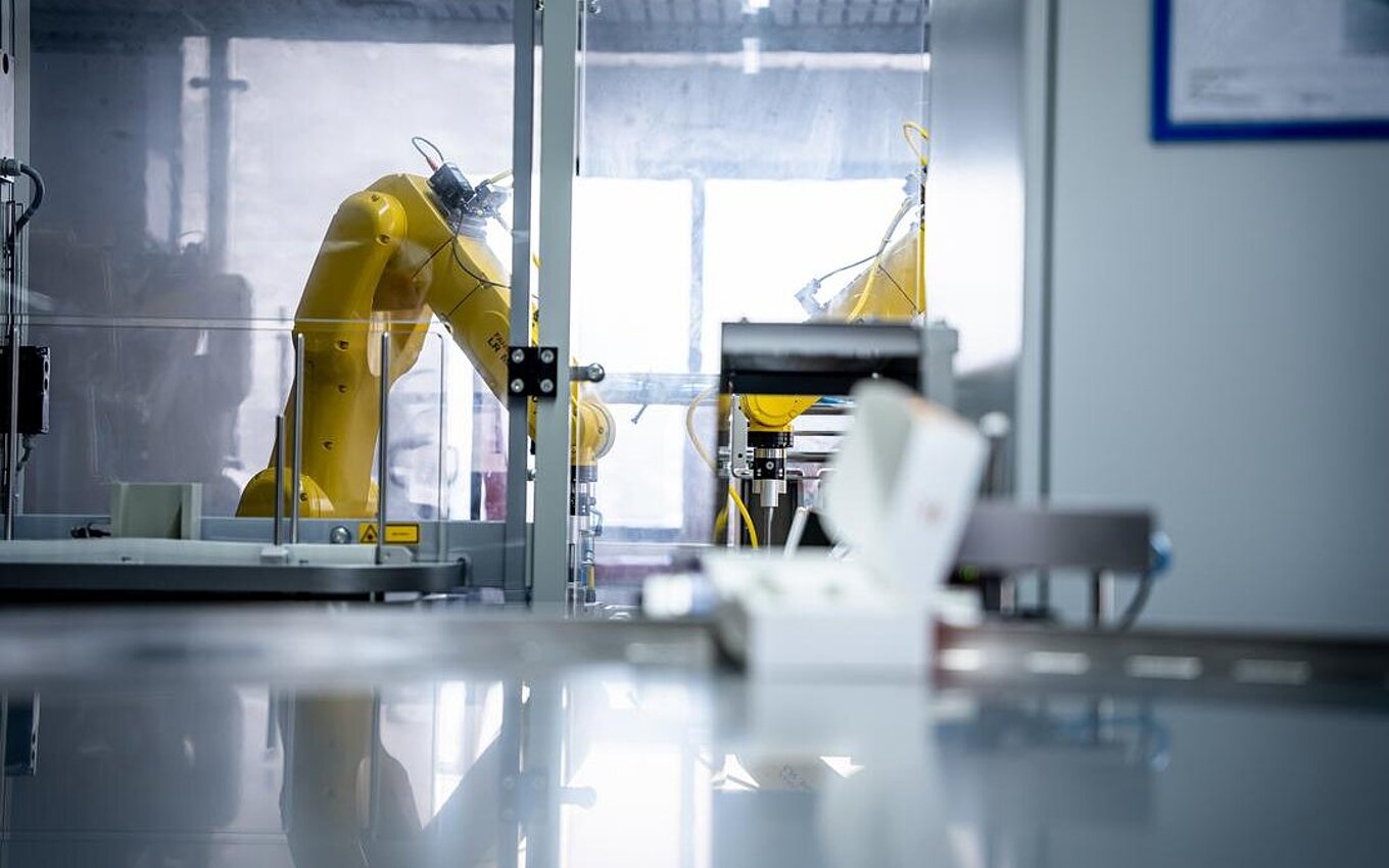 Automated robotics in Faller Packaging’s PrePackaging Service – innovative pharmaceutical packaging solutions.