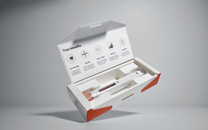 Pharma packaging with moulded fibre tray replacing plastic insert – sustainable secondary packaging solution by Faller Packaging and Harvest Packaging.